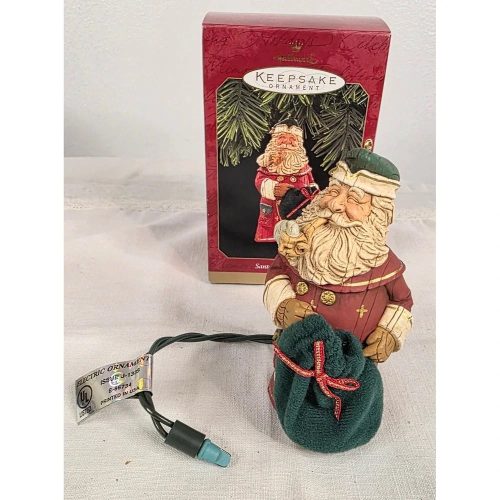 Hallmark Keepsake 1997 Santa's Secret Gift Musical Magic Ornament Robert Chad